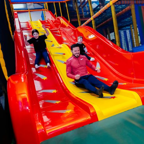big red wavy slide at play valley dinnington